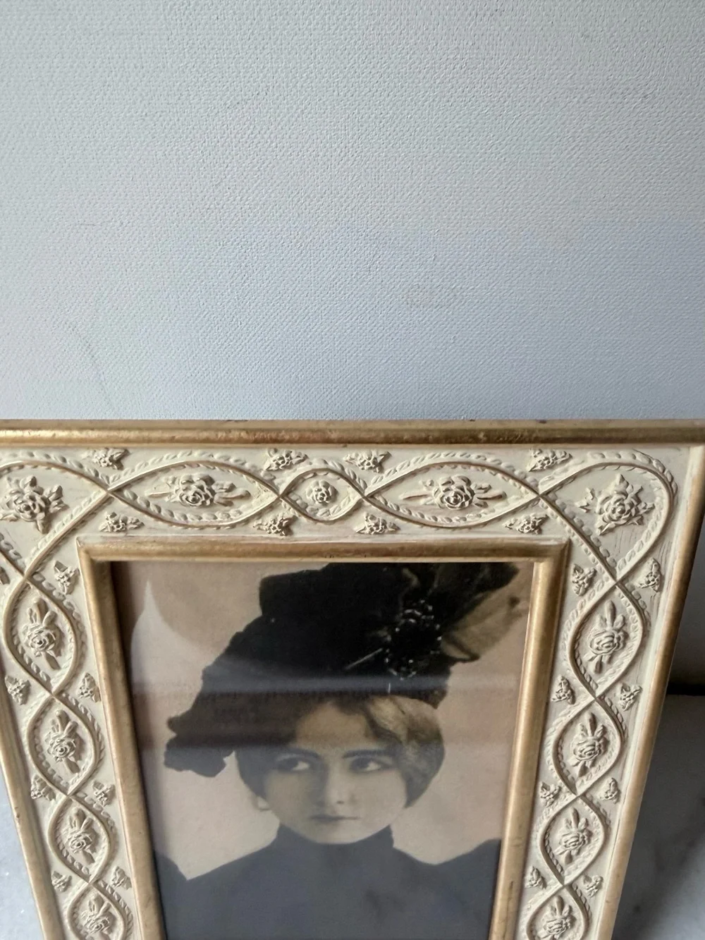 White metal decorative picture frame with gold accents